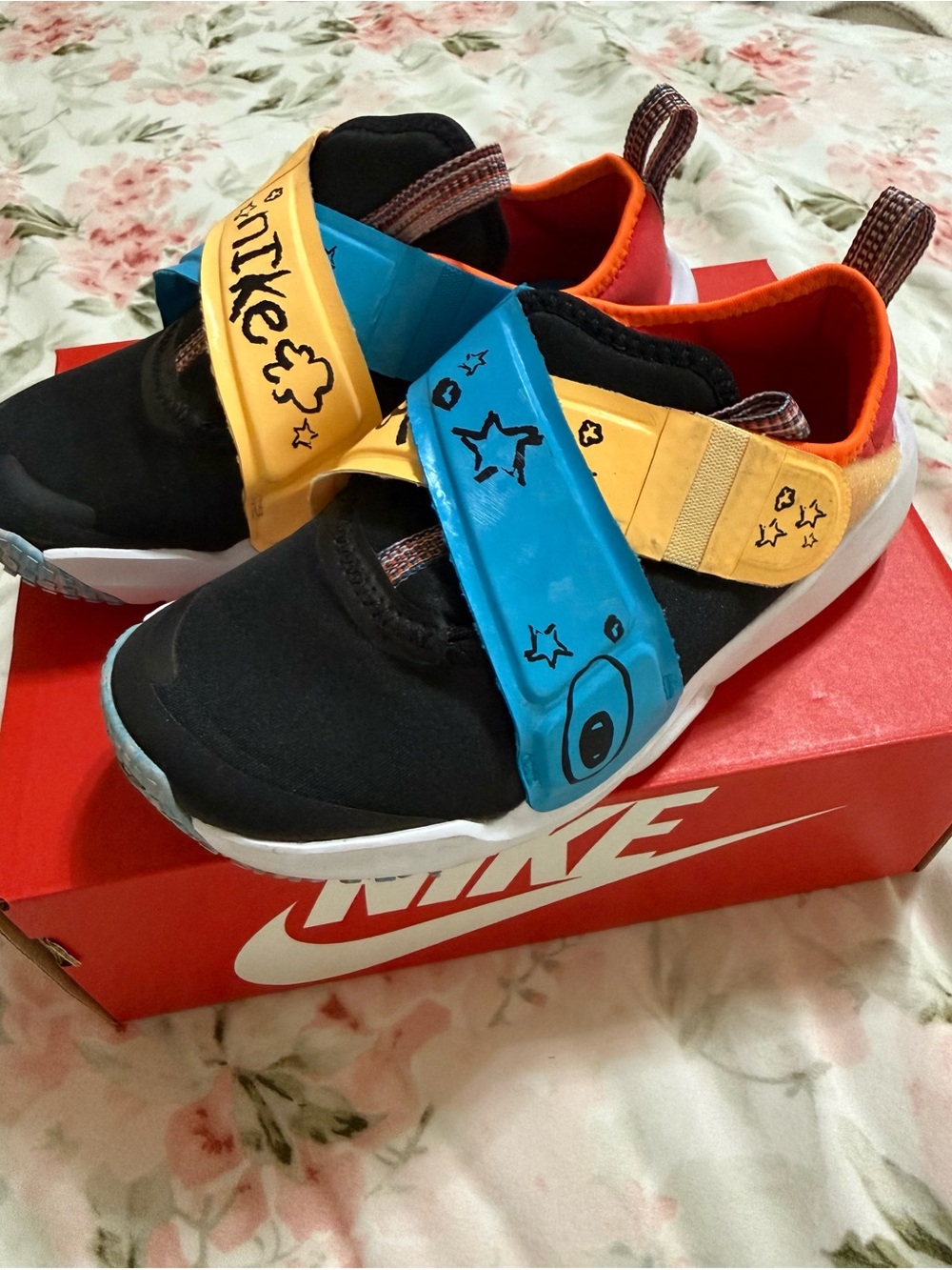 Nike Kids Black, Blue & Yellow Slip-On Sneakers with Orange Lining